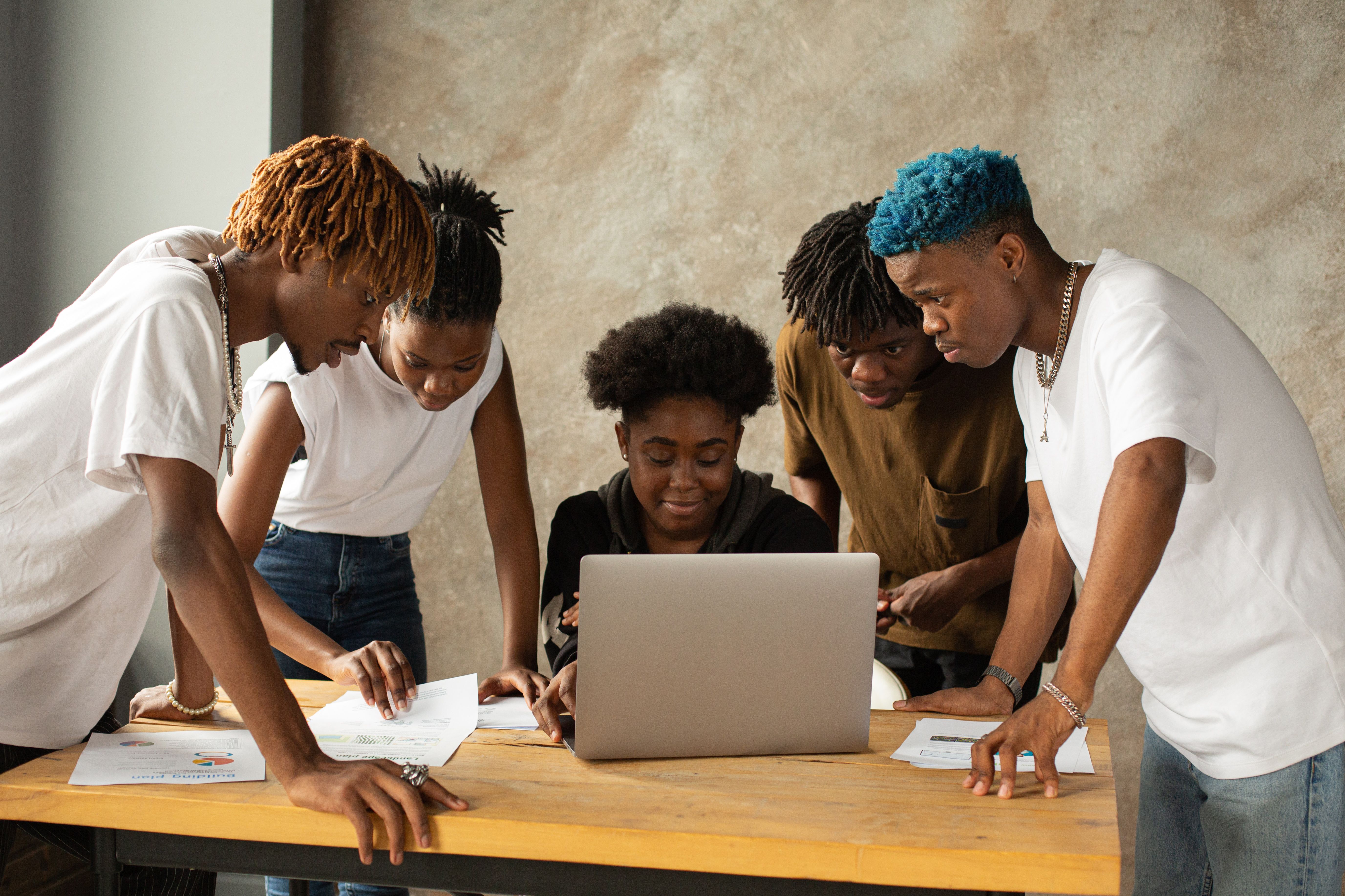 A team collaborating around a table in a bright office